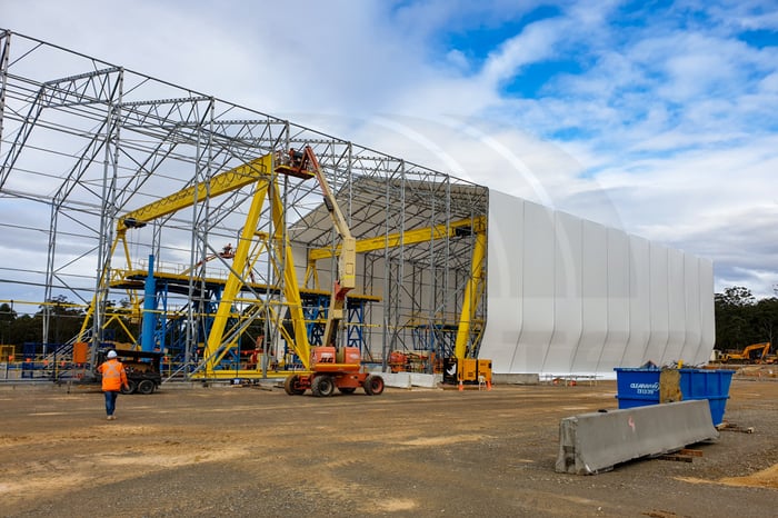 image of fabric building roof half installed